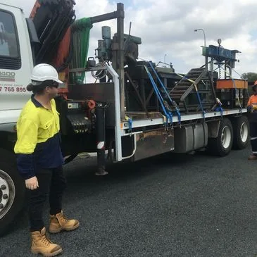 Plant machinery being relocated on a truck